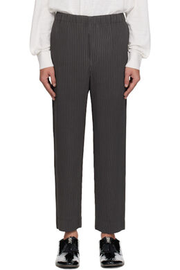 Homme Plissé Issey Miyake: Серые брюки 