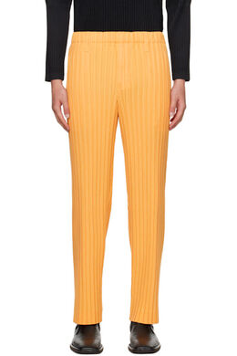 Homme Plissé Issey Miyake: Оранжевые брюки 