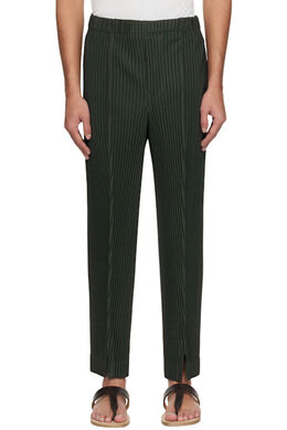 Homme Plissé Issey Miyake: Зелёные брюки 