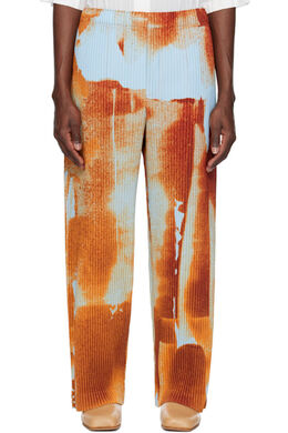 Homme Plissé Issey Miyake: Оранжевые брюки 