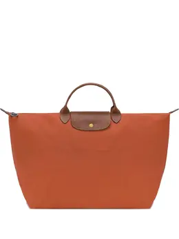 Longchamp: Оранжевая сумка-шоппер  Le Pliage