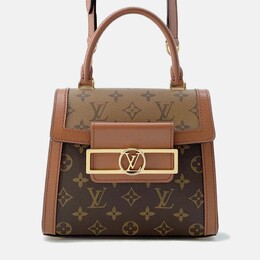 Louis Vuitton: Коричневая сумка 