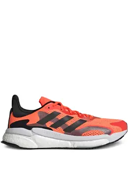 adidas: Оранжевые кроссовки  SolarBoost