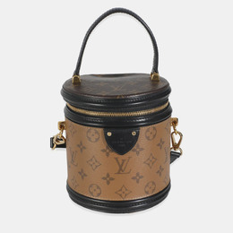 Louis Vuitton: Двухцветная сумка 