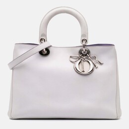Dior: Фиолетовая сумка 