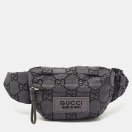 Gucci: Поясная сумка  GG