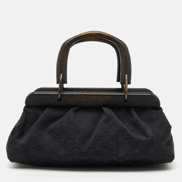 Gucci: Чёрная сумка  GG