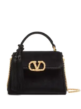Valentino Garavani: Чёрная сумка 