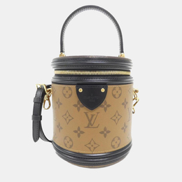 Louis Vuitton: Коричневая сумка 