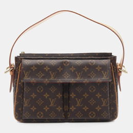 Louis Vuitton: Коричневая сумка 
