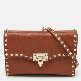 Valentino: Коричневая сумка через плечо  Rockstud