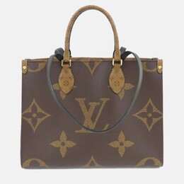 Louis Vuitton: Коричневая сумка-шоппер 