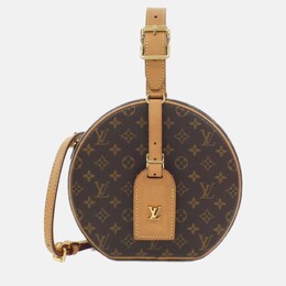 Louis Vuitton: Коричневая сумка 