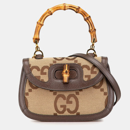 Gucci: Бежевая сумка  GG