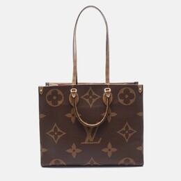 Louis Vuitton: Коричневая сумка-шоппер 