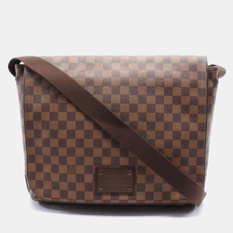 Louis Vuitton: Коричневая сумка через плечо 