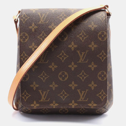 Louis Vuitton: Коричневая сумка  Musette