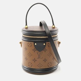 Louis Vuitton: Коричневая сумка 