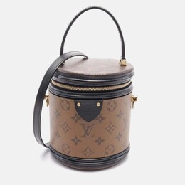 Louis Vuitton: Коричневая сумка 