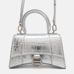 Balenciaga: Серебристая сумка  Hourglass