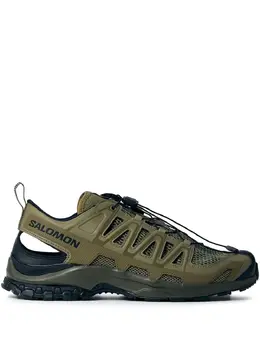 Salomon: Зелёные кроссовки 