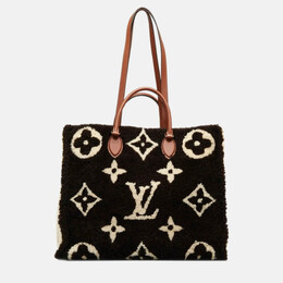 Louis Vuitton: Бежевая сумка-шоппер 