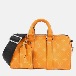 Louis Vuitton: Оранжевая сумка  Keepall