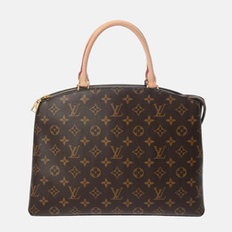 Louis Vuitton: Коричневая сумка 