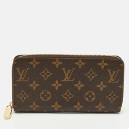 Louis Vuitton: Коричневый кошелёк  Zippy