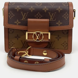 Louis Vuitton: Коричневая сумка 