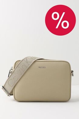 Calvin Klein: Бежевая сумка 