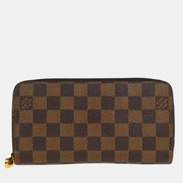 Louis Vuitton: Коричневый кошелёк  Zippy