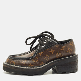 Louis Vuitton: Чёрные лоферы 
