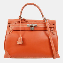 Hermes: Оранжевая сумка  Kelly 35