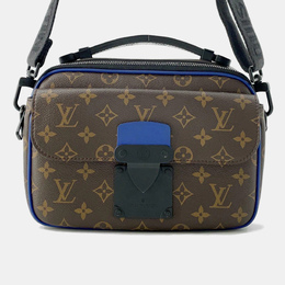 Louis Vuitton: Коричневая сумка 