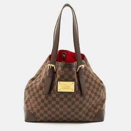 Louis Vuitton: Коричневая сумка 