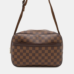 Louis Vuitton: Коричневая сумка 