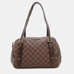 Louis Vuitton: Коричневая сумка 