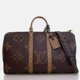 Louis Vuitton: Коричневая дорожная сумка  Keepall