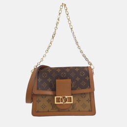 Louis Vuitton: Коричневая сумка 