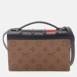 Louis Vuitton: Коричневый кошелёк 