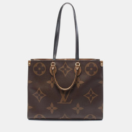 Louis Vuitton: Коричневая сумка 