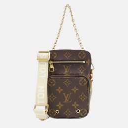 Louis Vuitton: Коричневая сумка через плечо 