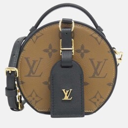 Louis Vuitton: Коричневая сумка 