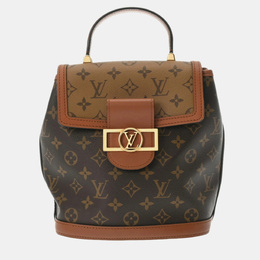 Louis Vuitton: Коричневый рюкзак 