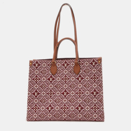 Louis Vuitton: Розовая сумка-шоппер 