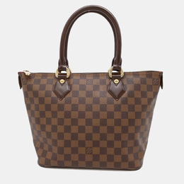Louis Vuitton: Красная сумка-шоппер 