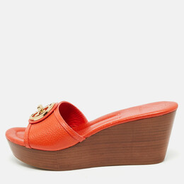 Tory Burch: Оранжевые сандалии 