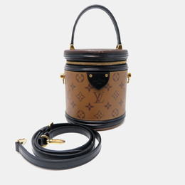 Louis Vuitton: Коричневая сумка 