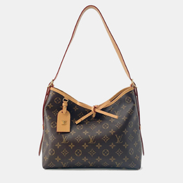 Louis Vuitton: Коричневая сумка 